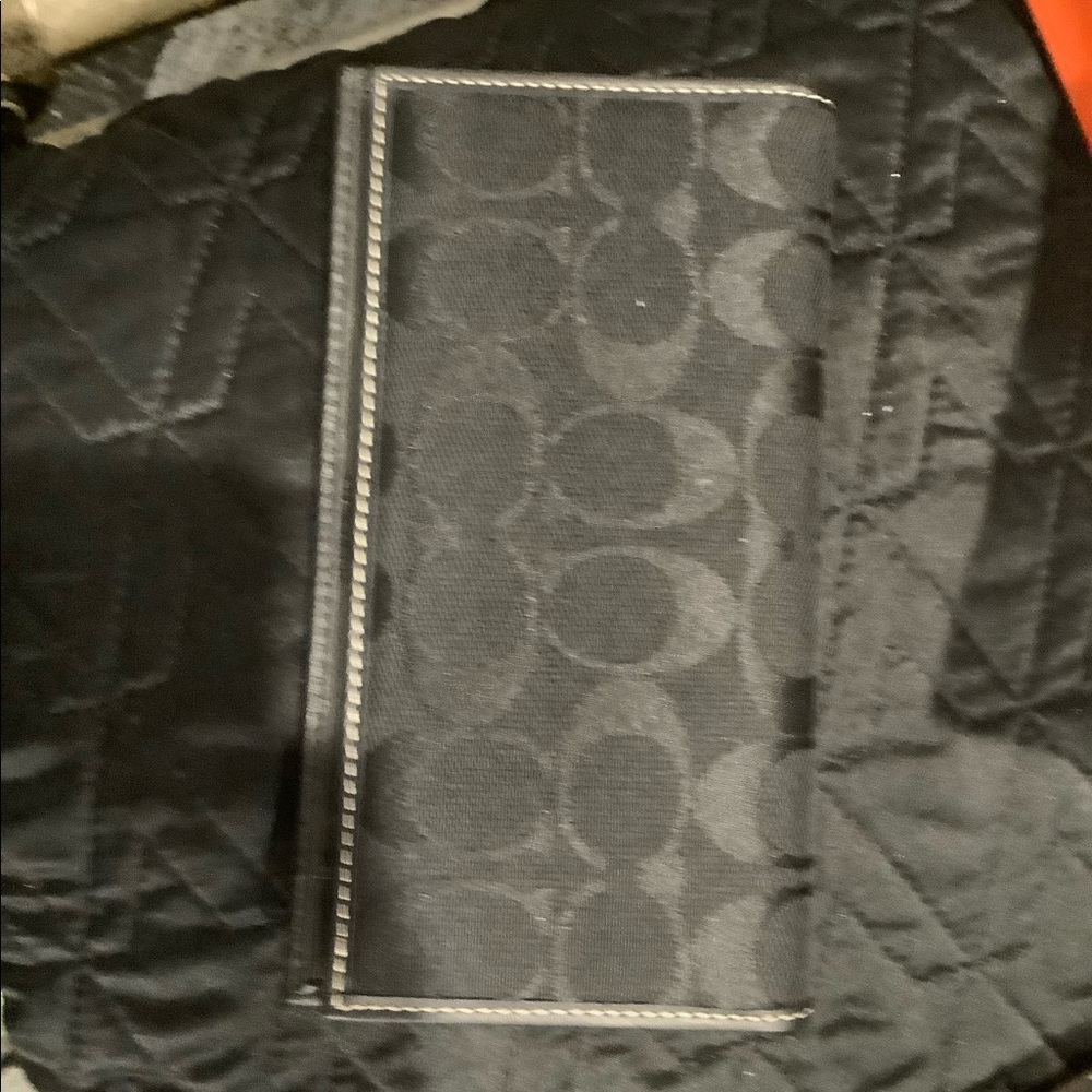 Coach black checkbook cover